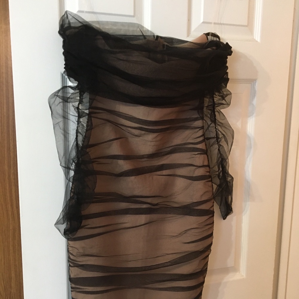 Two dresses (sold separately).